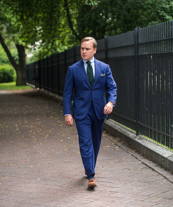 Wearing a Blue Suit with a Green Tie